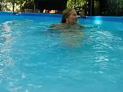 WHOA! Melissa the Mermaid Stuns by Poolside with Sexy Ink!