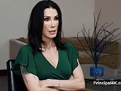 Fit mature wife interacts with head teacher in office setting