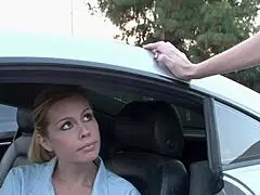 A Stunning Blonde Comforts Another In The Parking Lot.
