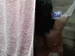 caught my aunt bathing at home, she masturbates and nearly spots me!