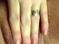 Milf exhibitionist drips pussy while dirty talking and using dildo in stockings by window