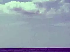 monika fox poses in pink bikini on beach