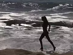 Licking the pussy of a slutty mom in fishnets on bed.