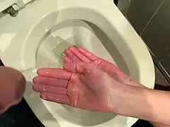 watch me hold his dick while he pees and wash my hands in it