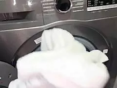 i can't believe this chubby blonde is banging a young guy in the laundry room