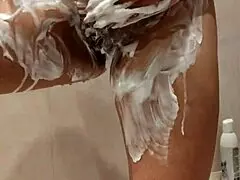 the stepsister is seen naked in the shower during her daily bathing routine at home