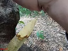 Perverted Slut Squirts Piss From Wooden Stake In Forest