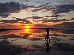 walk on red sunset of elton salt lake, tits outdoor