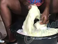 as a dedicated housewife, i tackle the weekend laundry routine, folding clothes neatly in our cozy home.