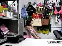 The tattooed latina milf thief gets caught and fucked for stealing in the office.