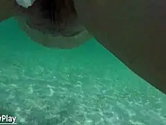 this bbw amateur swims underwater in her underwear at the beach.