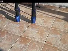 denim shorts hug black tights and gorgeous 8 inch heels on a latina milf in lingerie and jeans