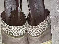 In this dirty tale, the stepmom's heels get covered in cum as she teases her son-in-law