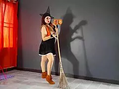 Halloween Witch in Regina Noir Style with Pumpkins and Broom Regina Noir as Velma Dinkley in Yellow Pantyhose Performing in Old House at Stairway