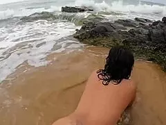 Busty Spanish girl says, 'Watch me fuck on the public beach.'