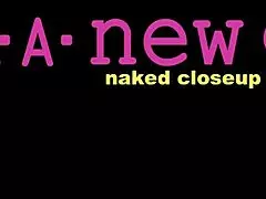 alluring brunette beauty reveals her stunning figure on the sofa