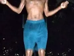 Cute brunette in park fitness solo