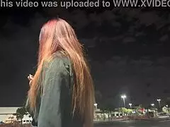 Artemisia Love smokes outdoors in Los Angeles at night