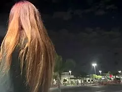 Artemisia Love smokes outdoors in Los Angeles at night