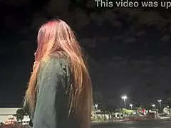 Artemisia Love smokes outdoors in Los Angeles at night