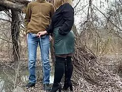 Curvy mother-in-law with big ass and natural tits holds my cock outdoors while i pee. She shows her hairy belly and dirty shoes.