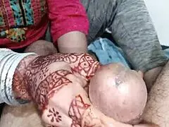 Muslim mistress massages servant with handjob