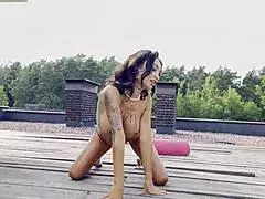 monika fox performs solo masturbation with a big dildo on the roof