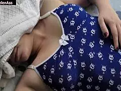 I lay on my friend's bed as he grabbed my pussy and tits, then I sucked him eagerly.