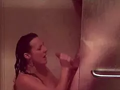Extremely horny cougar receives a facial in the shower.