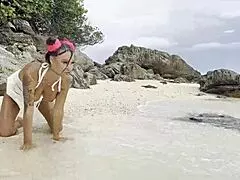 Monika Fox fucks pussy with big dildo on beach