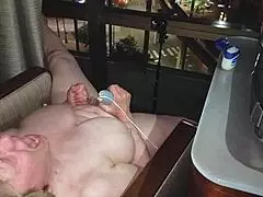 Hey, she's naked and pleasuring herself overlooking the city at night