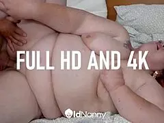 Two women share a big cock.