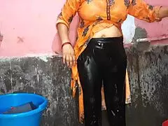 step sister in law is bathing and washing her big boobs