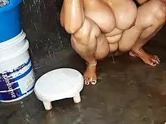 step sister in law is bathing and washing her big boobs