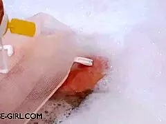 enchanting brunette muse enjoys a sensual bath