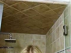 Elegant blonde model enjoys a sensual bath