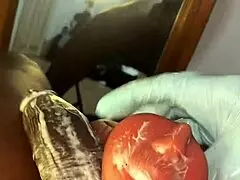 Stocking-clad person deep throats a toy intensely.