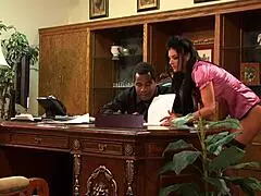 A White Assistant Arrives As Her Black Boss Interacts With Her At The Office