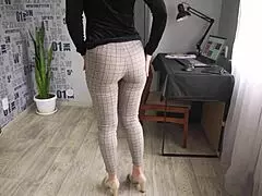 Office worker flaunts curves in tight trousers