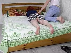 stepmom lays on bed tempting stepson for sex 😈