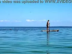 Amateur mature woman enjoys outdoor kayak adventure