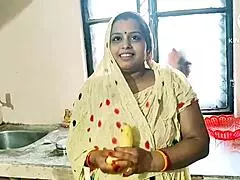 Desi Bhabhi Engages in Hardcore Fucking in Kitchen with Banana