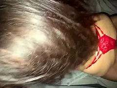 milf moaning against wall in red lingerie