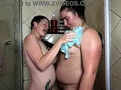 Mature and young lesbians enjoy pleasurable soapy shower