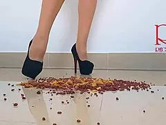 cornflakes get crushed under high heels boots on the floor