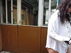 Plump Milf Smokes Cigarette While Urinating Outdoors On Street Bench