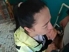 Risky blowjob on public staircase leads to swallowing cum mouthful