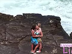 Tarra white licenses her tongue to lick pussy at the beach with a brunette teen