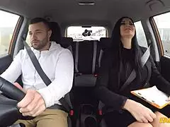 The milf examiner makes sexual advances to distract the male student in fake driving school.