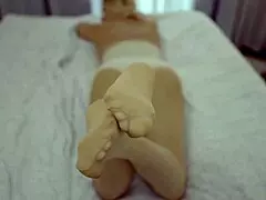 sexy blonde shows feet in nylons and wants cum on them 👣
